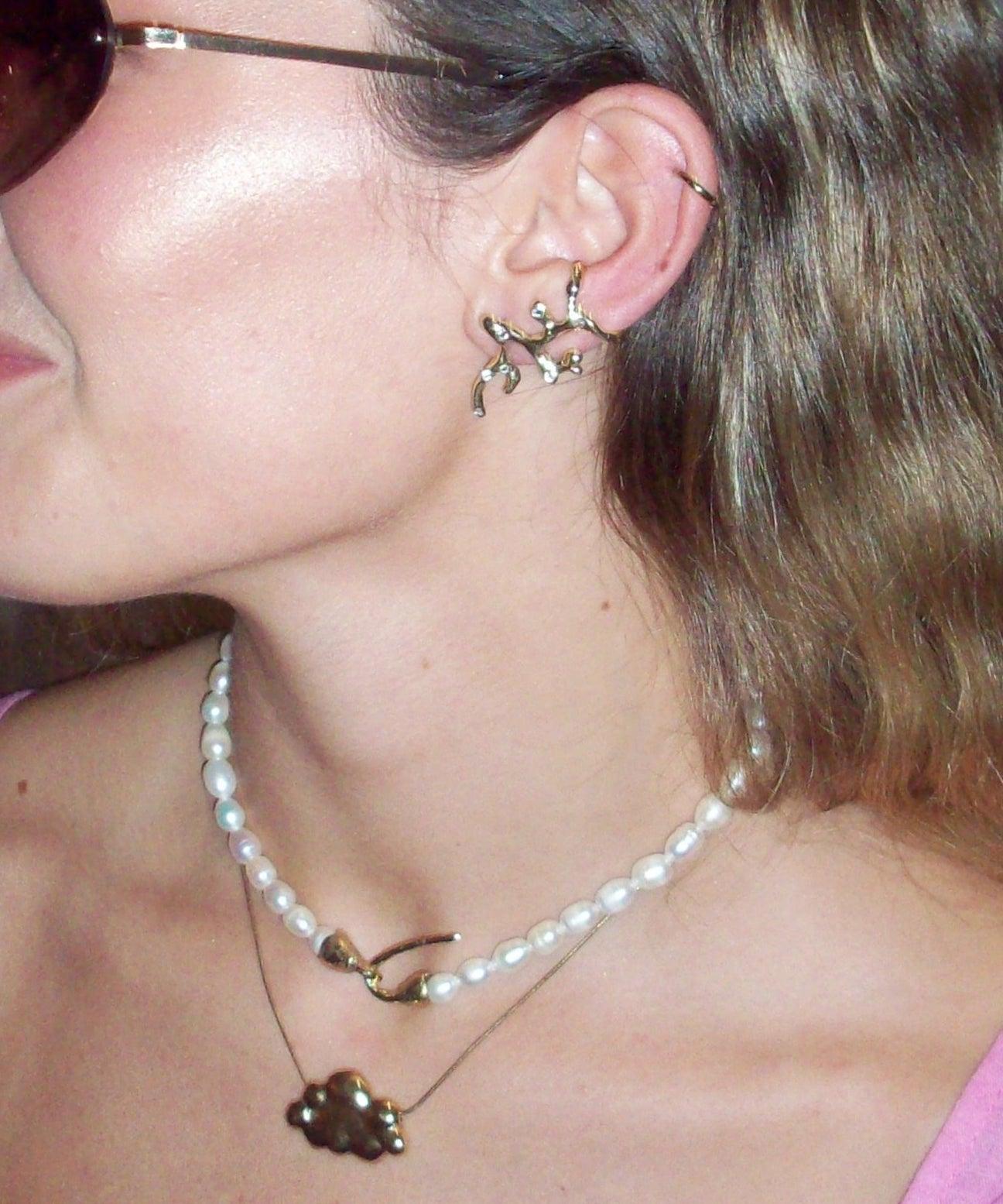 caravanas ear cuff coral dorado n/a