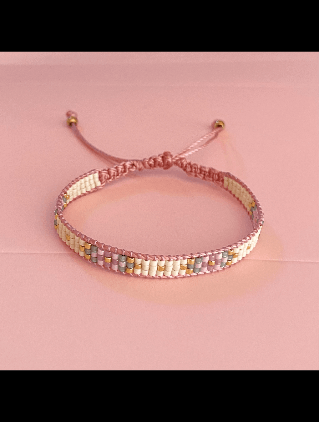 Pulsera COQUETTE tejida rosado pastel n/a