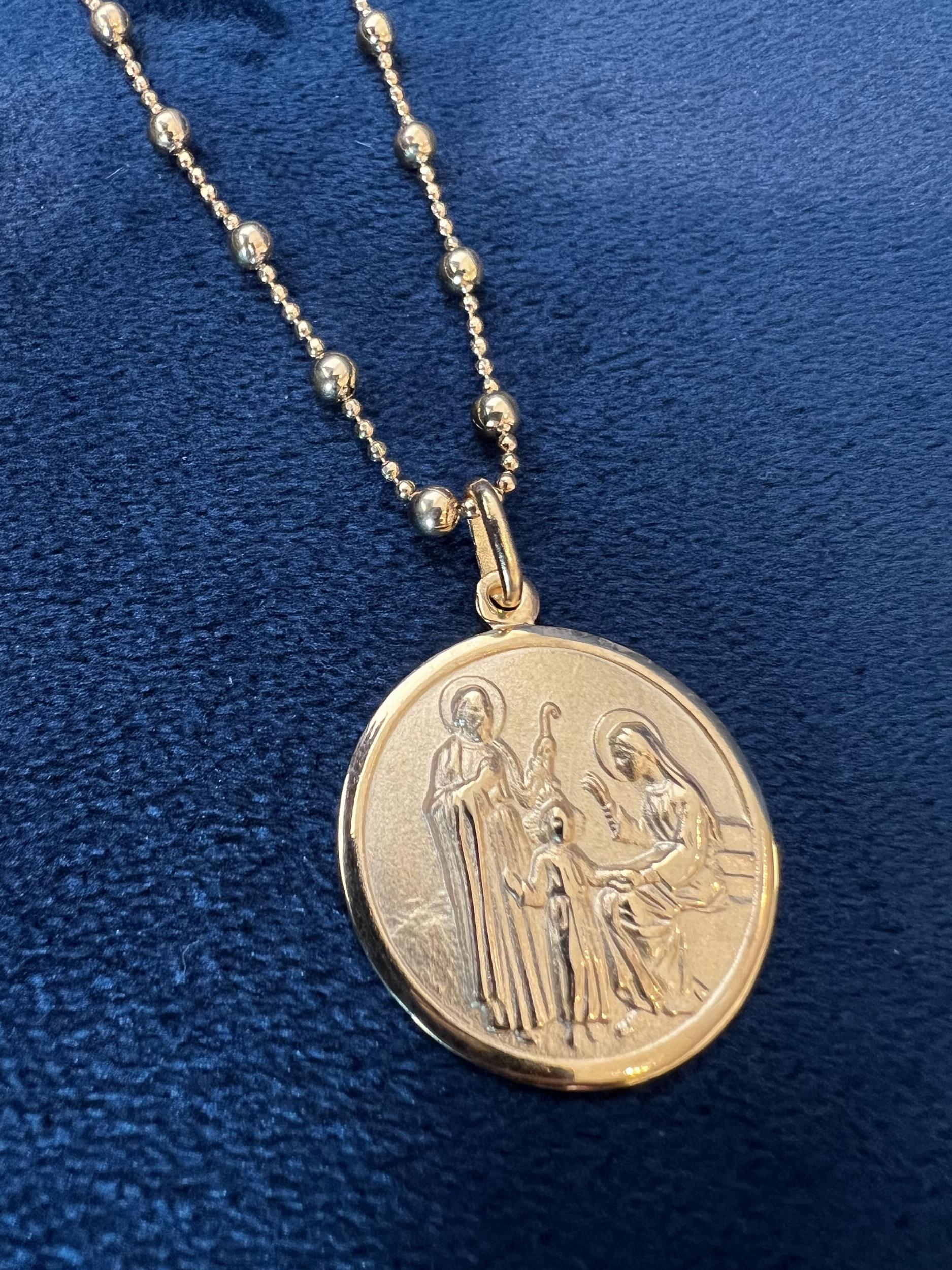 Medalla Sagrada familia dorado n/a