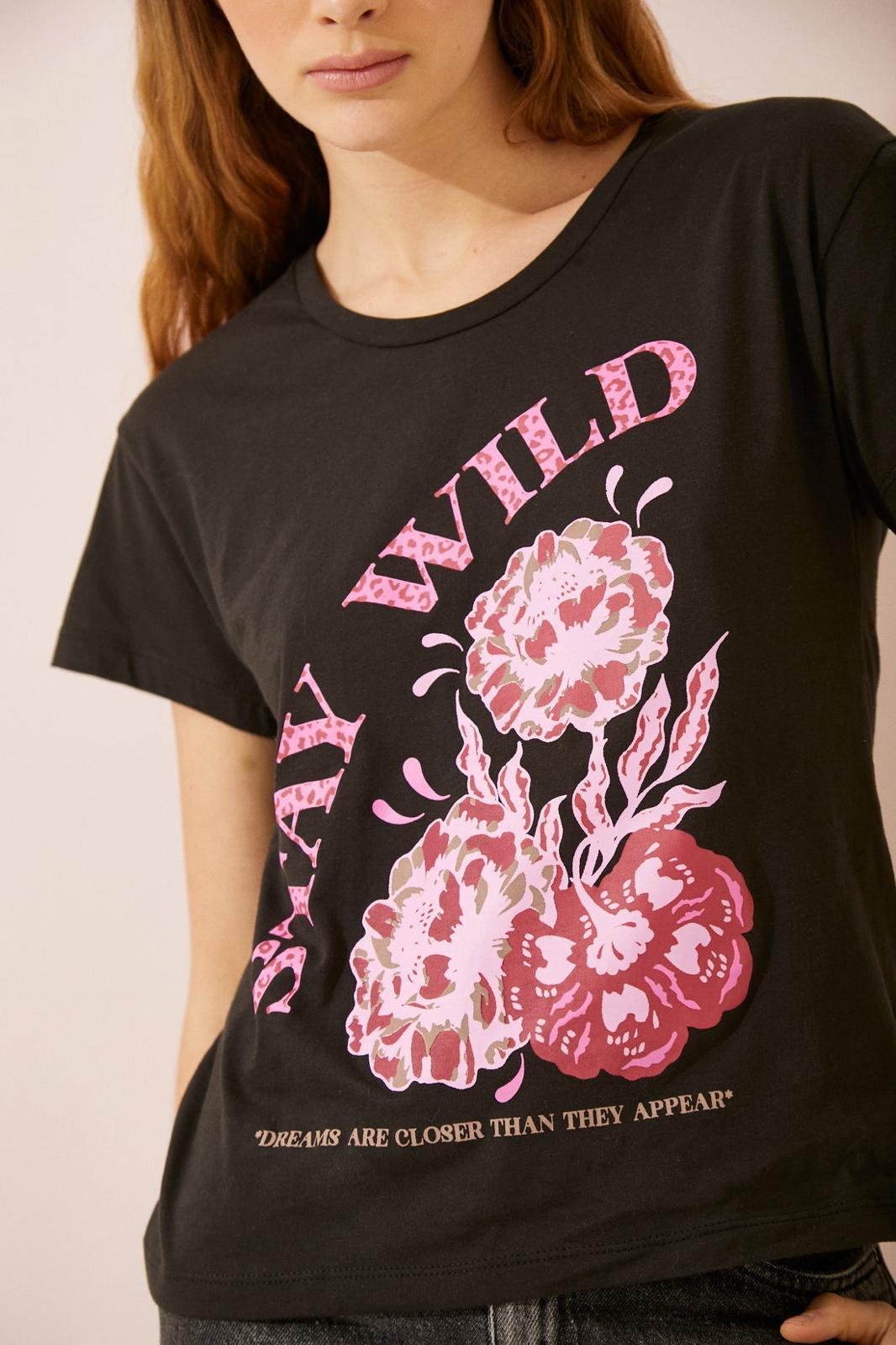 REMERA WILD negro m/l