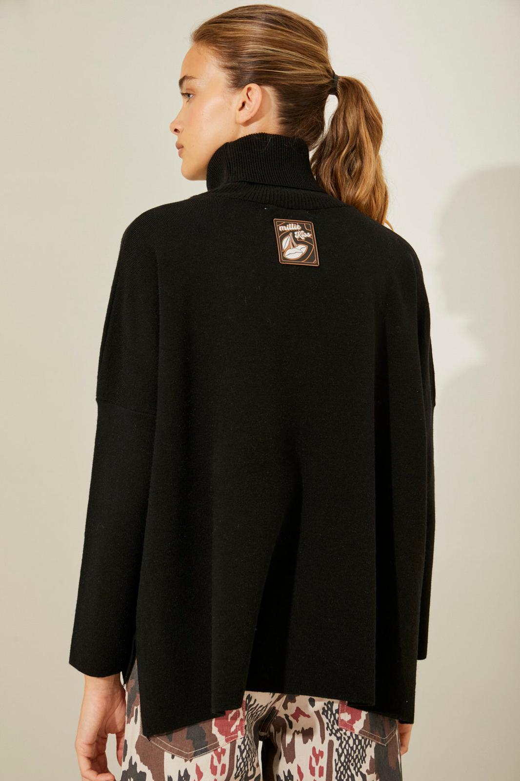 Polera Oliver negro talle unico