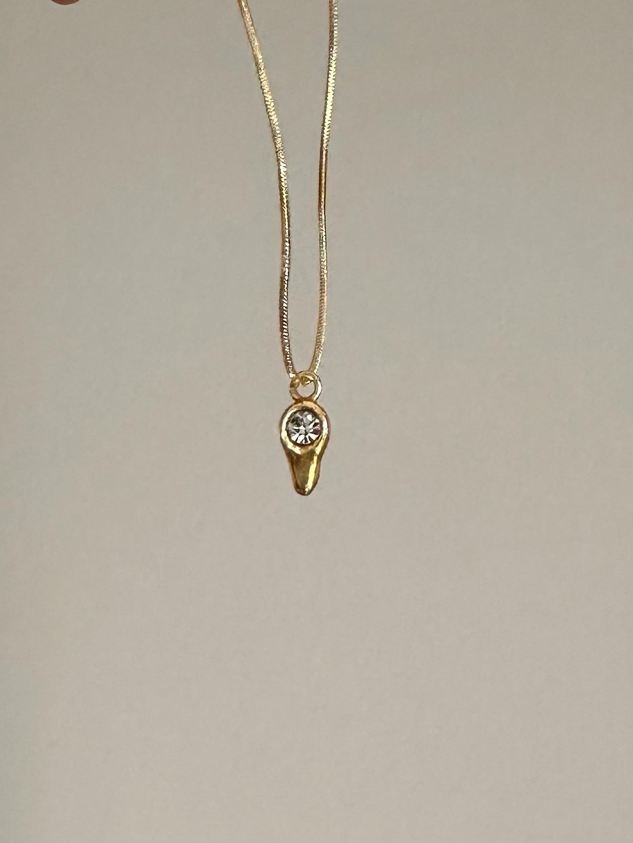 gota con cadena dorado n/a